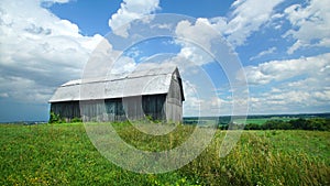 Old barn in middle of field