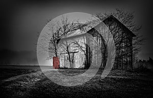 Old barn with a red door landscape