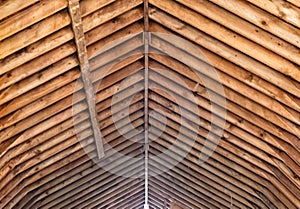 Old barn roof frame, rafters, being rehabilitated in a new development