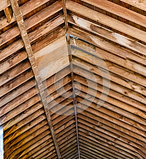 Old barn roof frame, rafters, being rehabilitated in a new development