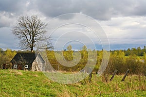 Old barn scene in western Russia. rustic old farm building. old rustic barn. Pskov oblast, Northwest part of Russia, Europe.