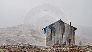 Old barn or shepherd`s hut in the Caucasus mountains