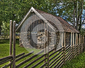 Old barn in stone from the 1600s in Sweden in HDR photo
