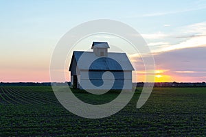 Old barn at sunset