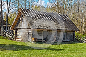 Old barn with thatch and two doors