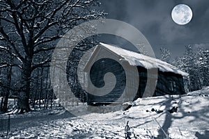 Old barn in winter snow