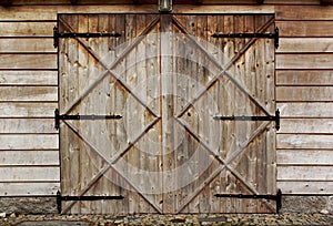 Old barn wooden door with four crosses