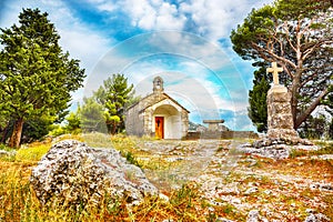 An old baroque church above the mouth of the river Cetina near Omis