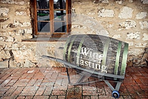 Old barrel with wine tasting text