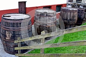 Old barrels of cider in the street photo