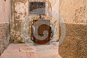 The Old Barrow for Goods selling on local Market Bazaar is lean to thw wall on the street