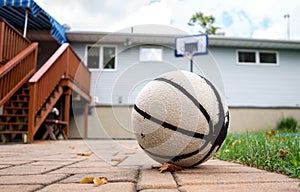 Old baskeball on the patio