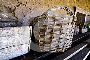 old basket made of wicker rods photo