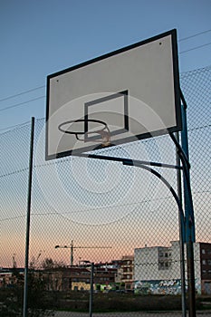 Old basketball backboard at outdoor street court