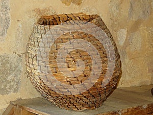 old baskets for the collection of flour in the old mills photo