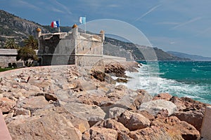 Old bastion on seashore. Menton, France