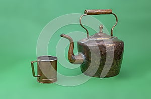 Old and battered copper kettle