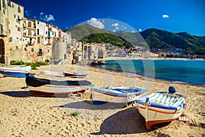 Old beach in Cefalu with fishing boats