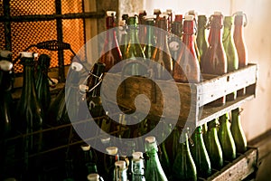 Old beer bottles in wooden cases