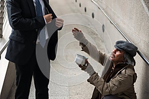 Old beggar or homeless ask for money
