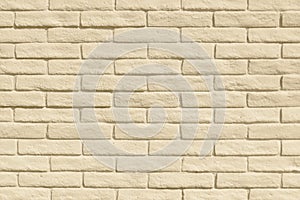 Old beige brick wall background texture