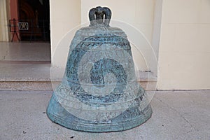 An old bell in front of the Basilica De La Virgen De La Caridad del Cobre near Santiago de Cuba