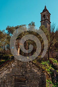 Old bell tower in the abandoned village of Gornji Stoliv in the Bay of Kotor, Montenegro