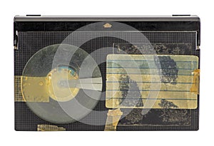 Old betamax video cassette isolated on white background. Vintage video technology. Blank, weathered sticker.