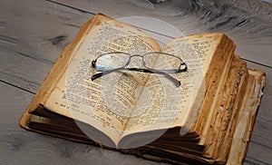 Old bible in Armenian on the grey background