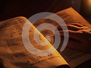 Old bible by candlelight