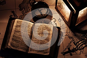 An old bible on a wooden table