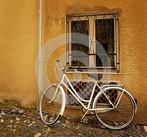 Old bicycle against wall