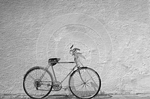 Old bicycle against wall