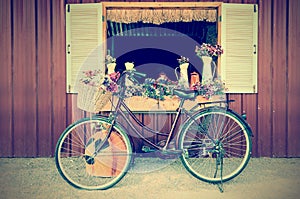 Old bicycle and flowers in vintage style