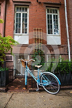 Old bicycle locked on the street in New York City