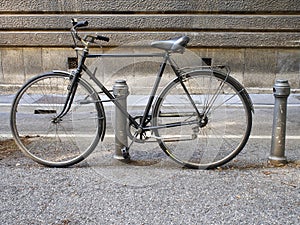 Old bicycle, parked with burglar.