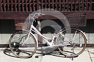 Old bicycle parked on the street