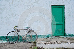 An old bicycle and wall