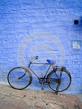 Old Bike on Blue Wall