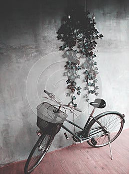 Old bike with loft wall in gray tone