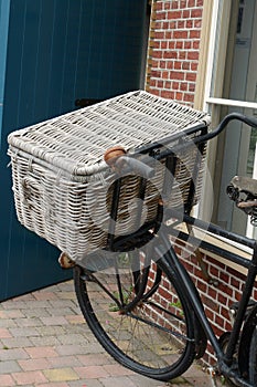 Old bike with reed basket photo