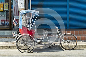 Old bike rickshaw rikshaw trishaw in Don Mueang Bangkok Thailand
