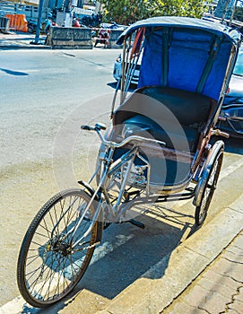 Old bike rickshaw rikshaw trishaw in Don Mueang Bangkok Thailand