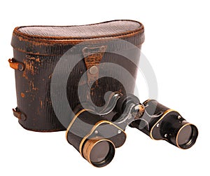 Old binoculars and case isolated on white