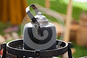 Old black coffee pot