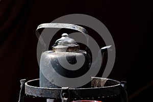 Old black coffee pot