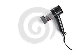 Old black hairdryer isolated on white background