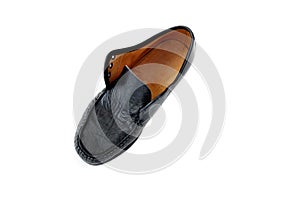 Old black leather shoes isolated on white