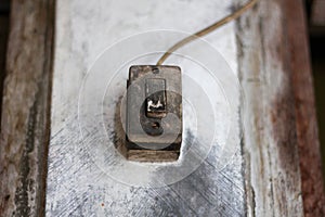 Old black light switch on white background