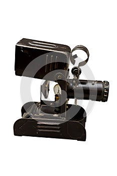 Old black motion picture projector isolated on white background